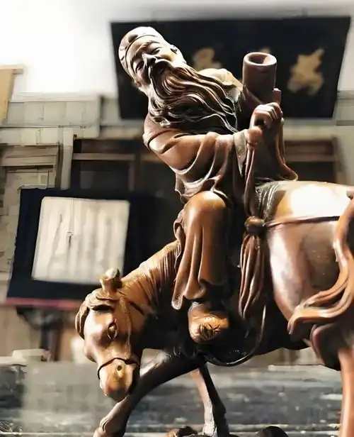 八仙里张果老为什么倒着骑驴