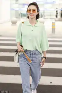 王丽坤穿绿色衬衫变元气少女手拿纳凉神器显清凉