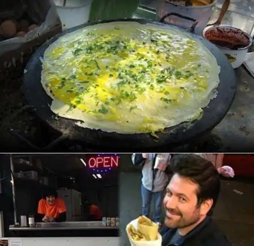 俄罗斯帅哥来中国,咬牙买了个煎饼果子,结账时被萌到了