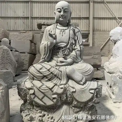 石雕地藏王的五佛冠与莲花座佛教智慧的视觉呈现